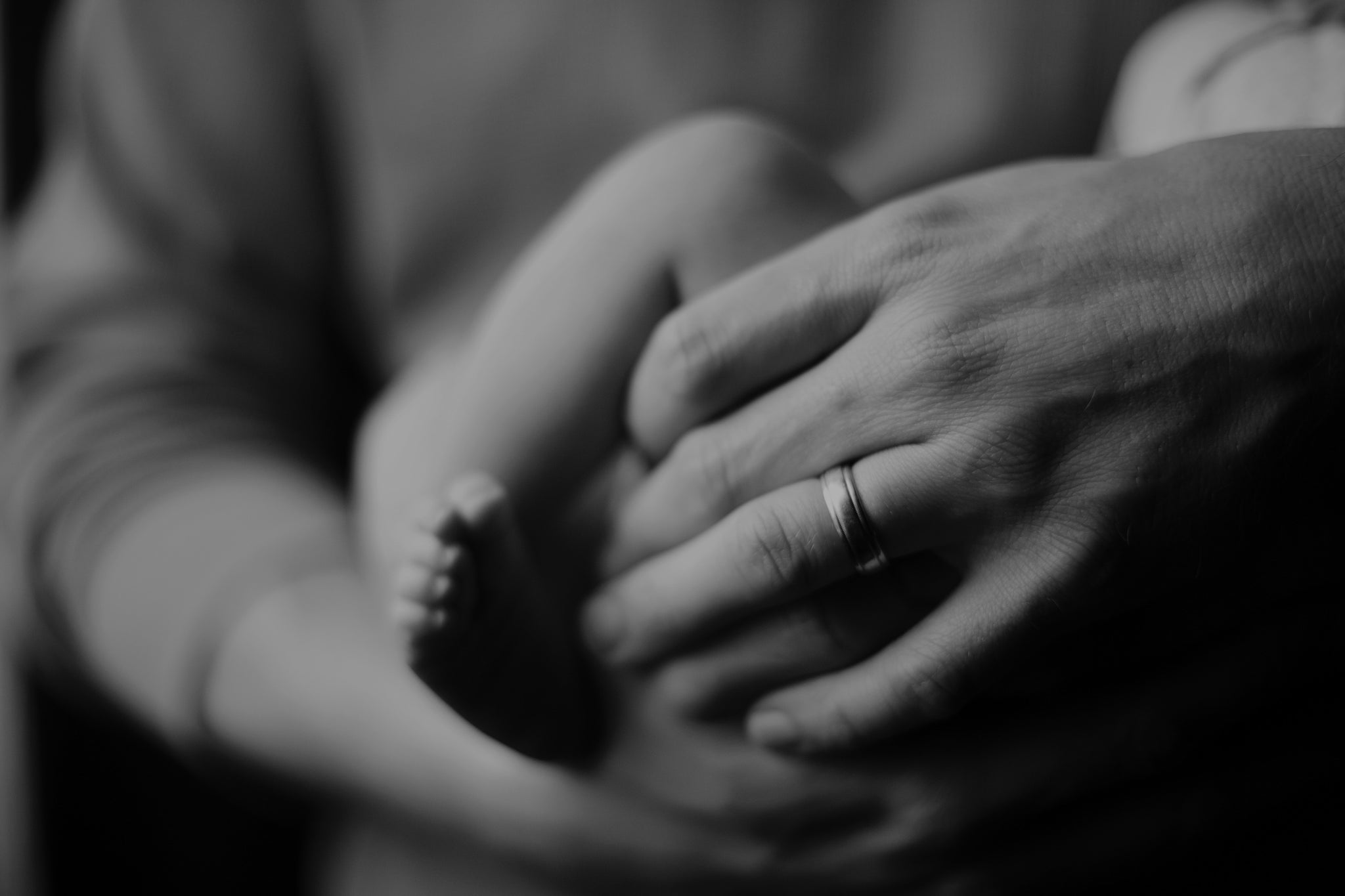 A father holding his infant child